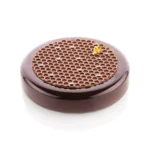 Glazed chocolate entremet with honeycomb decoration made using the Alvéolé 9 mat