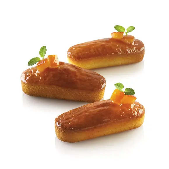 Three golden glazed mini plum cakes decorated with candied orange and fresh mint