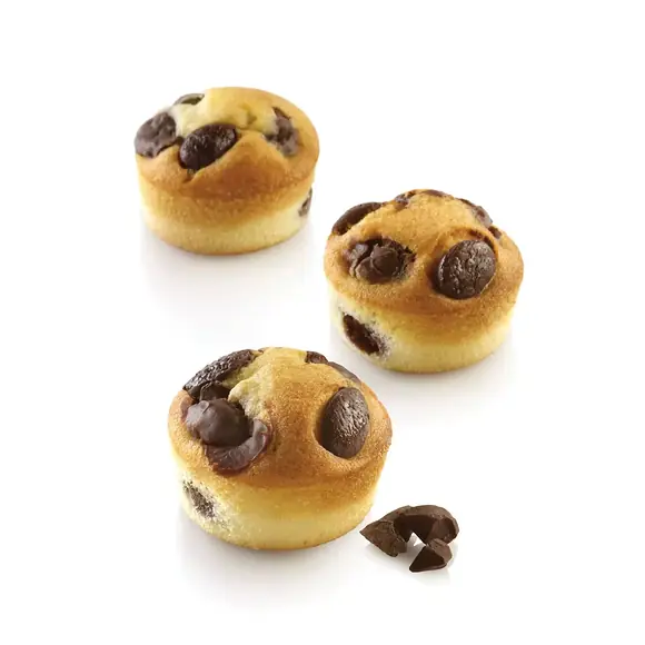 Three round golden cakes with chocolate pieces made using the Silikomart Airplus 13 mould