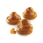 Three round glazed laminated pastries made using the Silikomart Airplus 14 mould