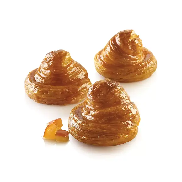 Three round glazed laminated pastries made using the Silikomart Airplus 14 mould