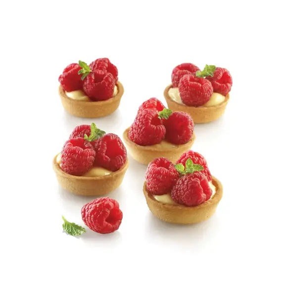 Five round raspberry and cream tartlets made using the Silikomart Airplus 16 mould