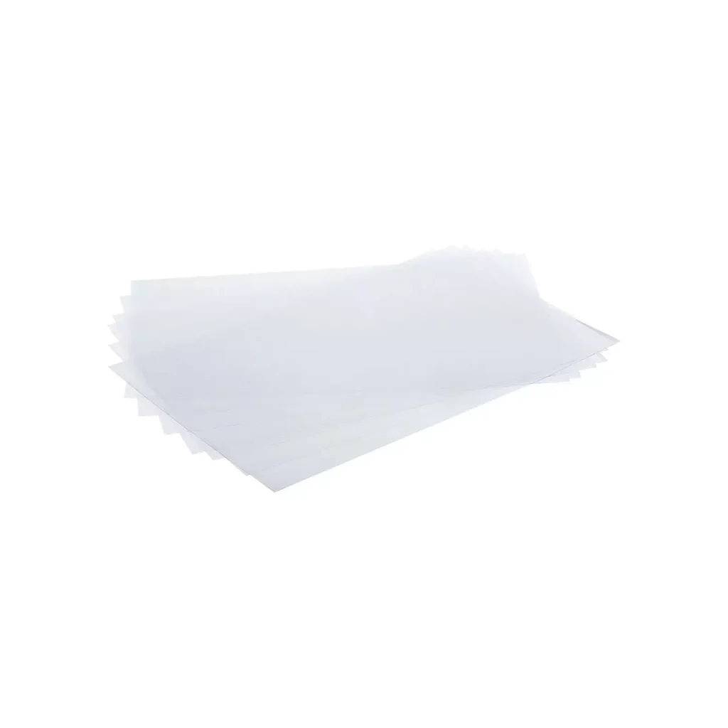Stack of clear Silikomart acetate sheets for chocolate measuring 600 × 400 mm