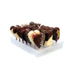 Assorted chocolate cakesicles displayed upright in the transparent Silikomart Espogel Up stand