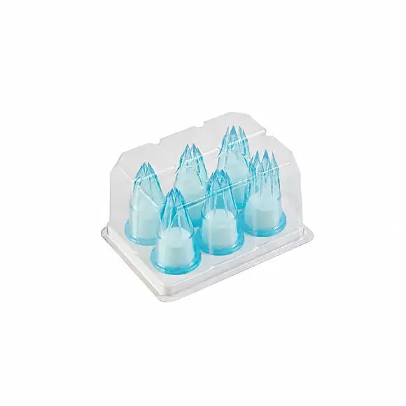 Six transparent blue Silikomart BPC6A polycarbonate star tubes in a storage case