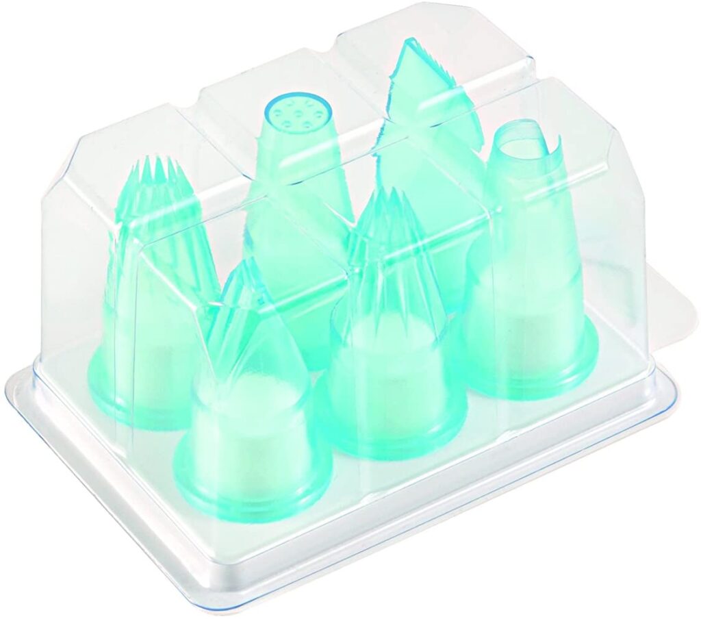 Six turquoise Silikomart BPC6C polycarbonate pastry tubes in a transparent storage case