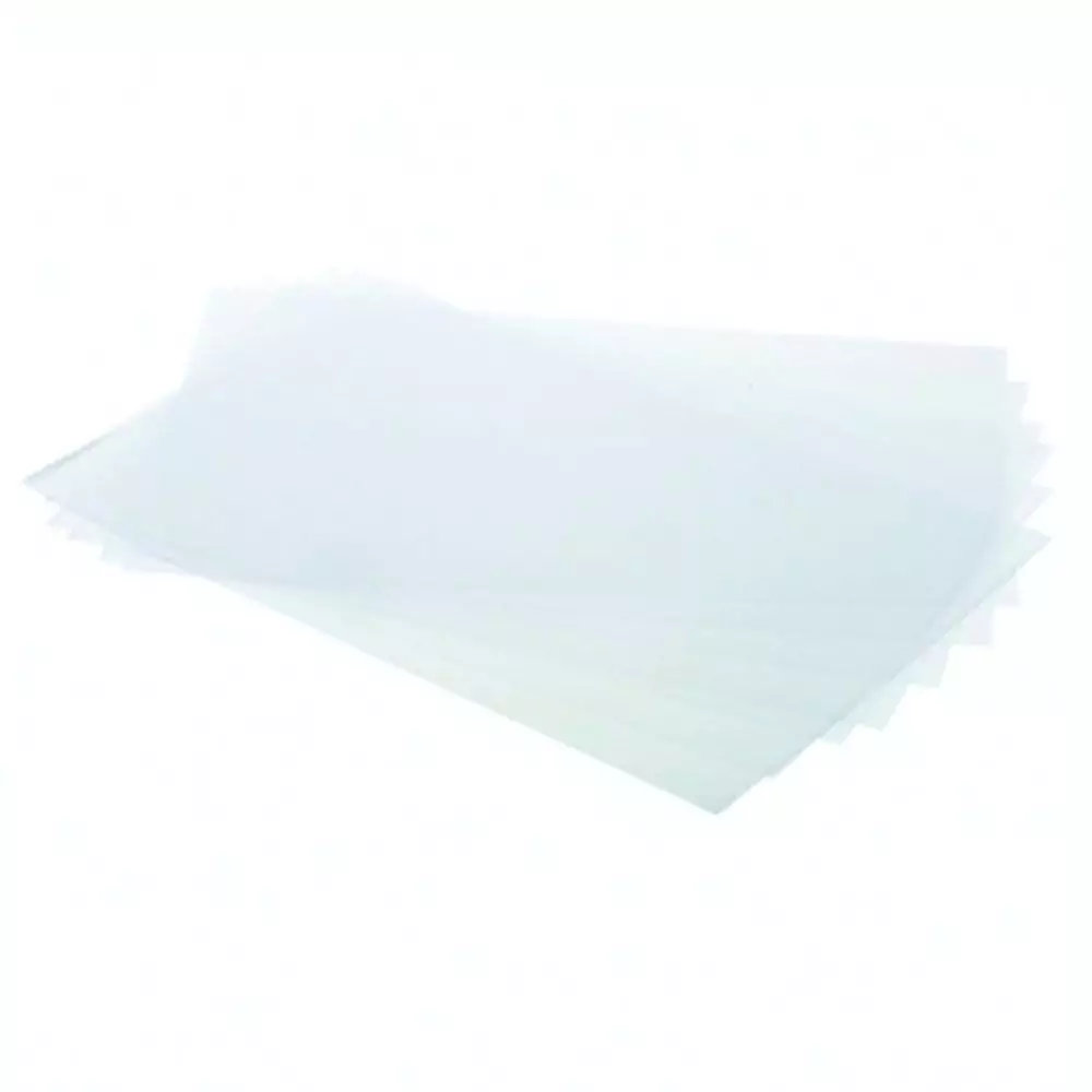 Stack of transparent Silikomart guitar sheets measuring 600 × 400 mm