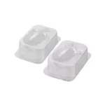Two transparent Silikomart Lady Cocca thermoformed mould halves for creating a three-dimensional chocolate hen