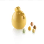 Yellow Lady Cocca chocolate hen displayed with five small coloured chocolate Easter eggs