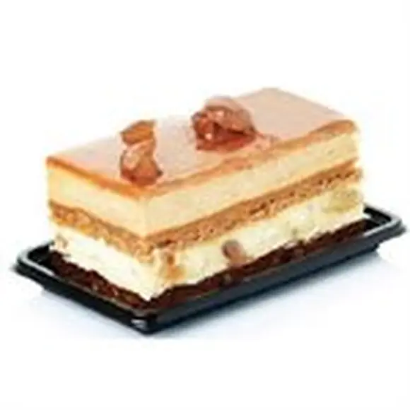 Layered rectangular cake presented on a black Silikomart tray