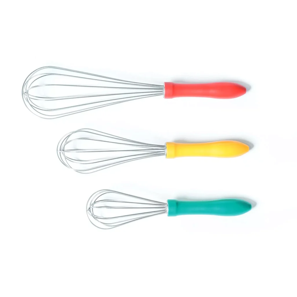 Yellow Silikomart Wonder Whisk Medium displayed between the Big and Small whisk sizes