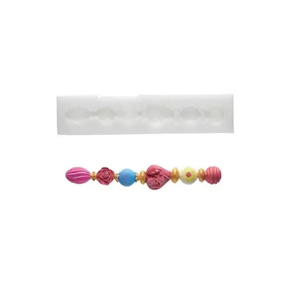 White Silikomart SLK280 Fantasy mould with a colourful finished ornamental border